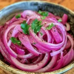 Sumac onions are a culinary gem that embodies the vibrant flavors and health benefits of Mediterranean cuisine. This dish transforms ordinary red onions into a tangy, refreshing accompaniment that can elevate any meal. The unique sour notes of sumac impart a bright twist to the familiar sweetness of red onions, creating a delightful contrast that is both eye-catching and palate-pleasing. Whether served alongside grilled meats, incorporated into salads, or used as a flavorful topping for flatbreads, sumac onions are incredibly versatile.